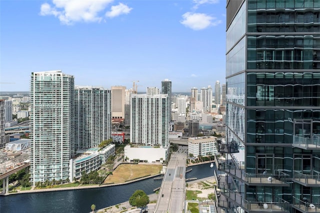 property's view of city featuring a water view