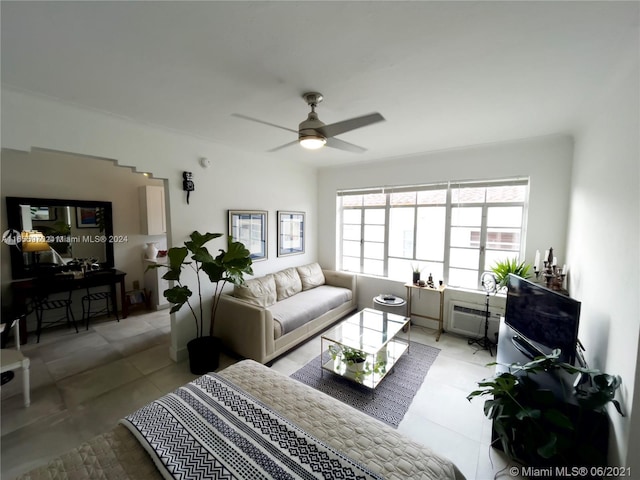 tiled living room with ceiling fan