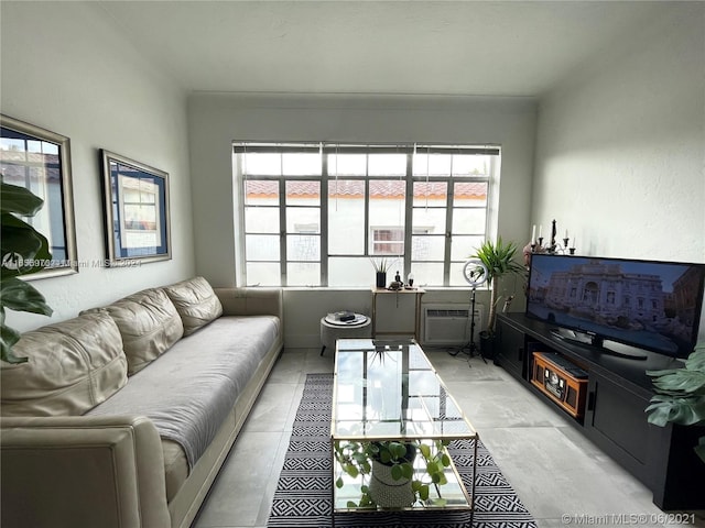 tiled living room with a wealth of natural light and an AC wall unit