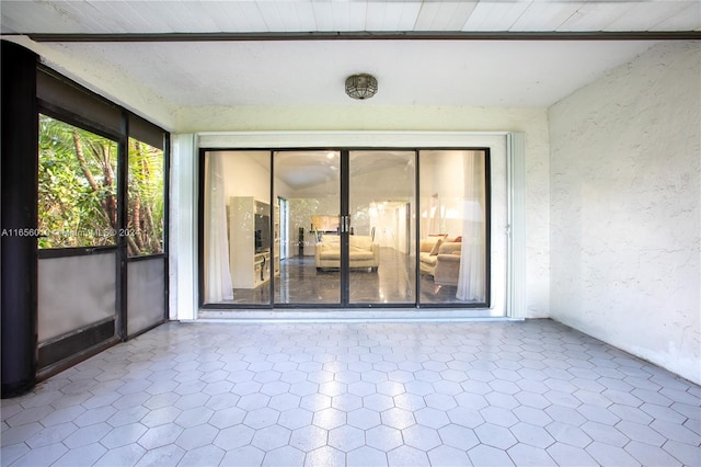 view of unfurnished sunroom