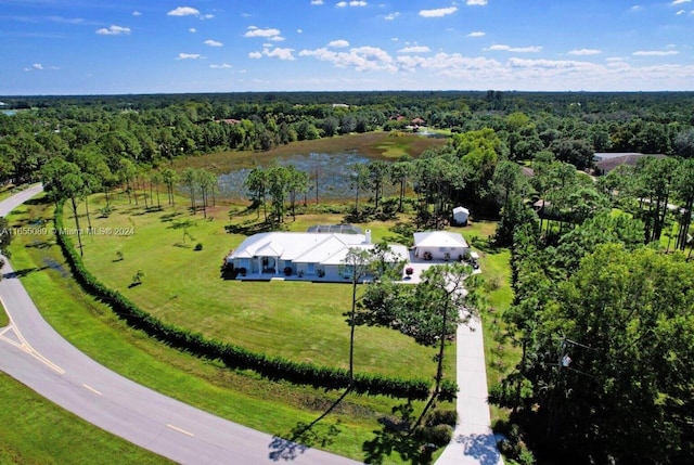 drone / aerial view featuring a rural view and a water view