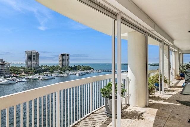 balcony featuring a water view