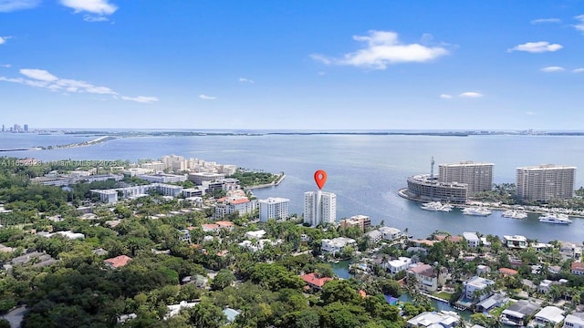 birds eye view of property featuring a water view