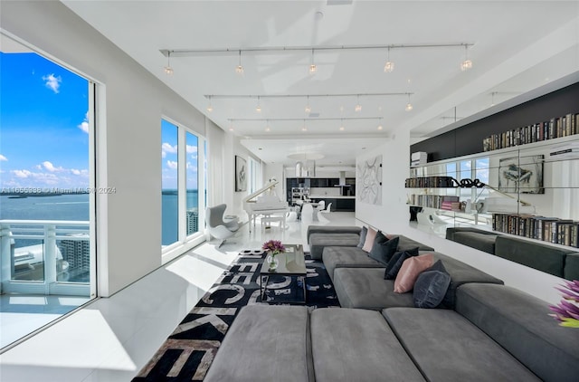 living room featuring a water view