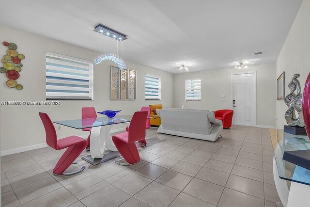 23841 SW 118th Pl, Homestead, FL 33032 - dining area with tile patterned flooring, baseboards, and visible vents
