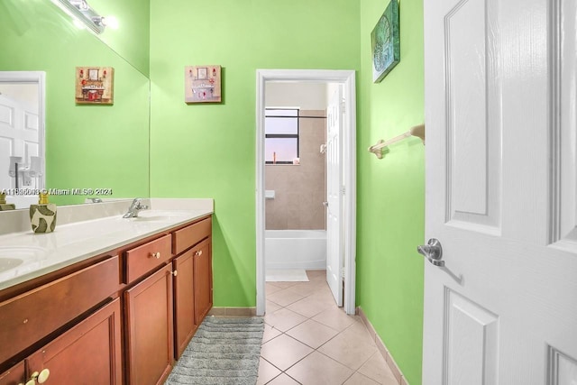 23841 SW 118th Pl, Homestead, FL 33032 - bathroom with a sink, baseboards, double vanity, and tile patterned flooring