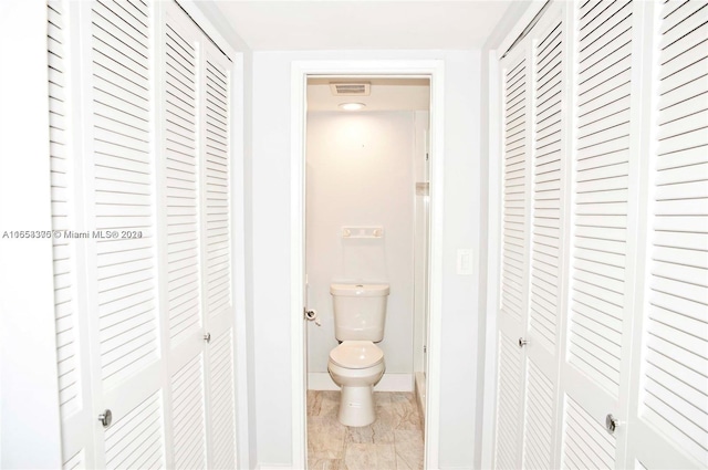 bathroom featuring toilet