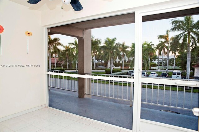 exterior space featuring ceiling fan