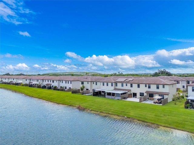 exterior space with a water view