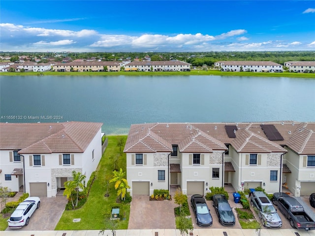 bird's eye view with a water view