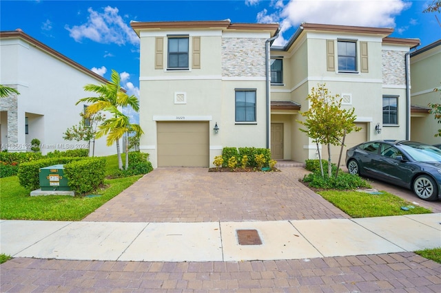 view of front of home with a garage