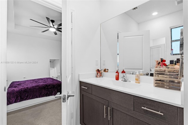 bathroom featuring vanity and ceiling fan