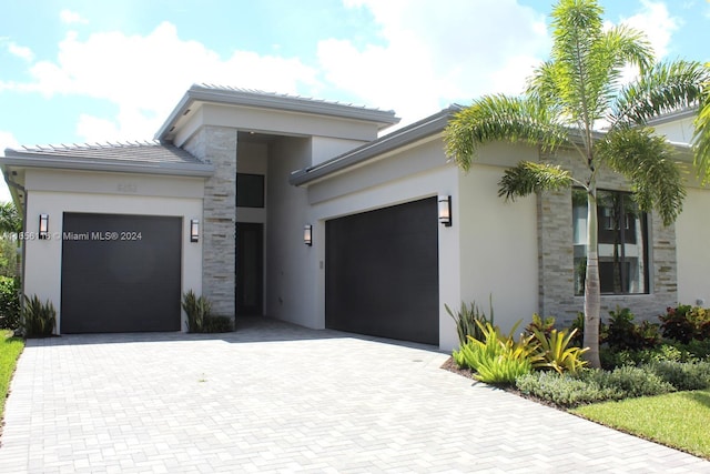 view of front of home with a garage