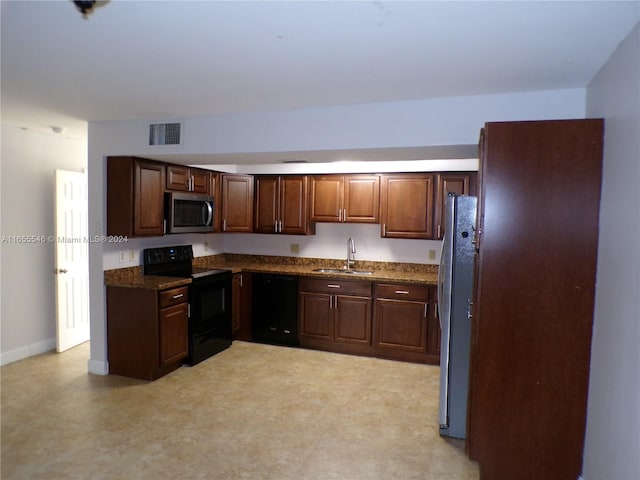 kitchen with sink and black appliances