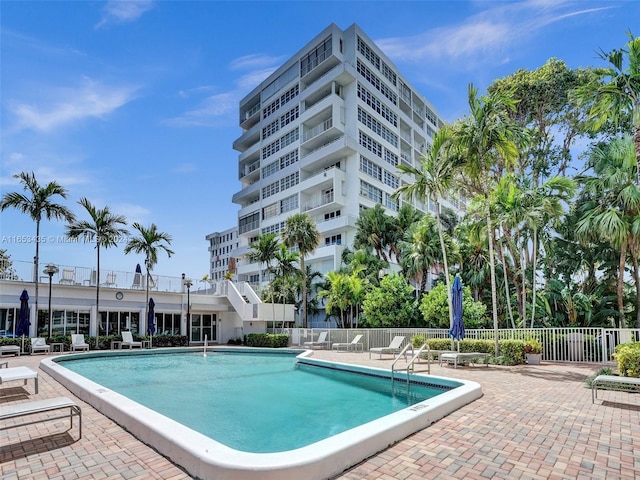 view of swimming pool with a patio