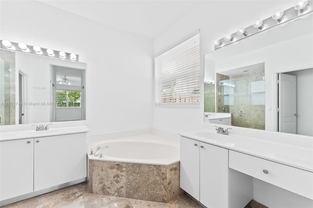 bathroom featuring independent shower and bath and vanity