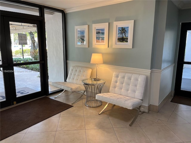 3200 N Palm Aire Dr Unit 501, Pompano Beach, FL 33069 - living area featuring crown molding and tile patterned flooring