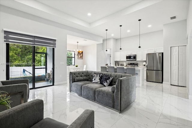 living room with a chandelier