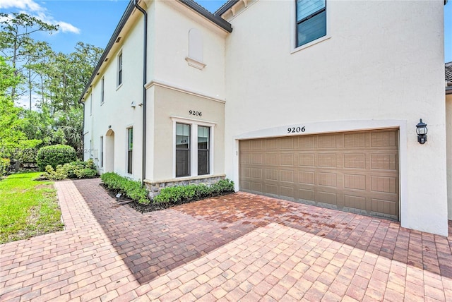 view of front of home with a garage