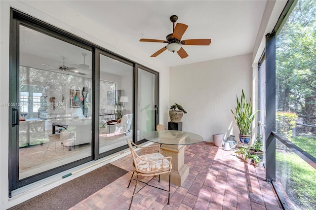 9206 Passiflora Way Unit 101, Boca Raton, FL 33428 - sunroom / solarium with ceiling fan and healthy amount of natural light