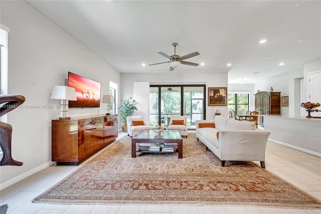 living room featuring ceiling fan