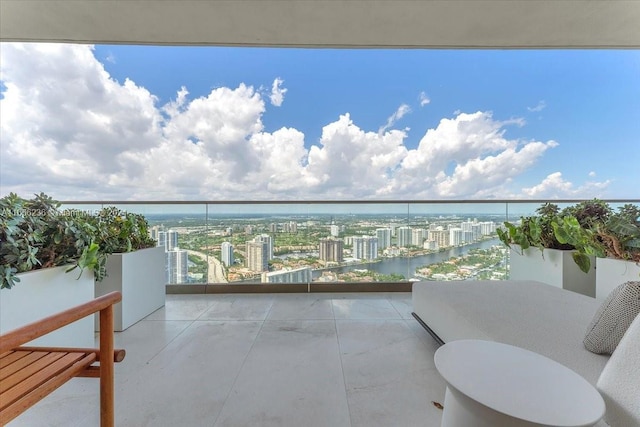 balcony with a city view and a water view