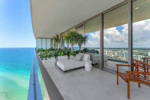 balcony featuring a water view