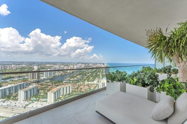 balcony featuring a water view