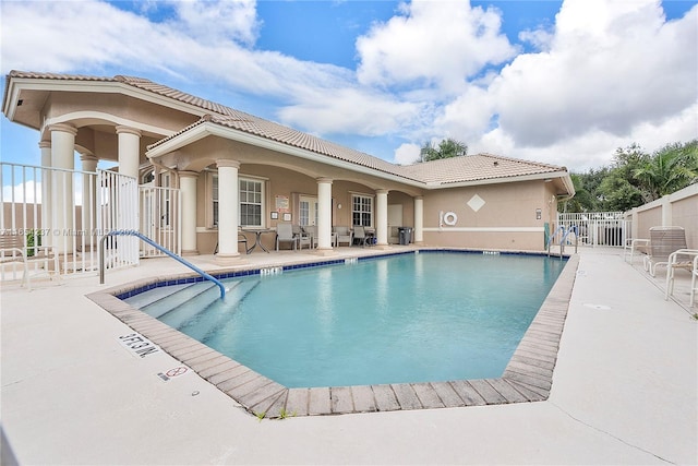 view of pool featuring a patio