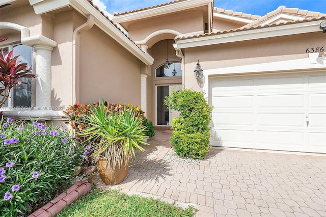 property entrance featuring a garage