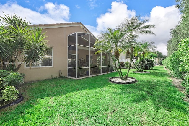 view of yard featuring a lanai