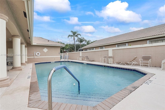 view of pool featuring a patio area