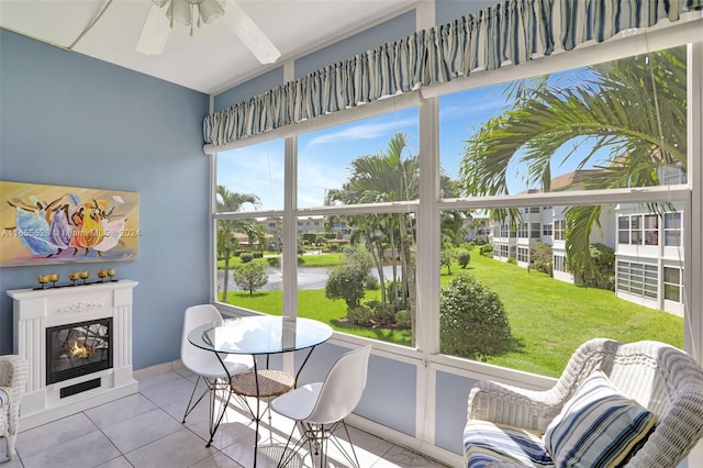 sunroom / solarium with ceiling fan