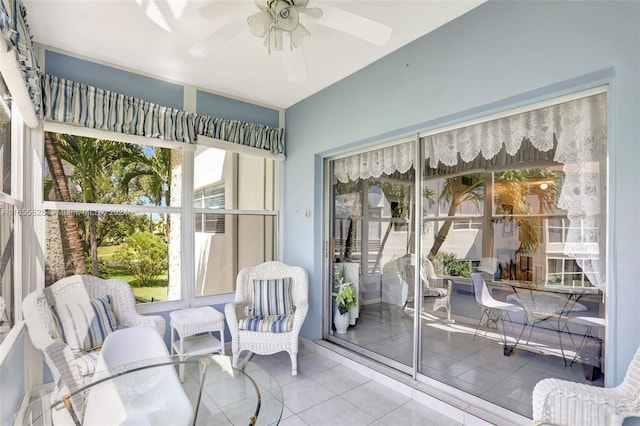 sunroom with plenty of natural light and ceiling fan