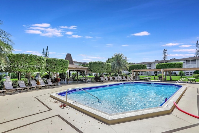 view of pool featuring a patio and a gazebo