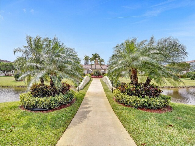3501 NW 47th Ave Unit 516, Lauderdale Lakes, FL 33319 - view of property's community with a water view and a yard