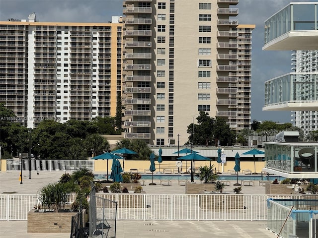 view of property with a swimming pool