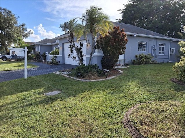 view of front of home with a front yard