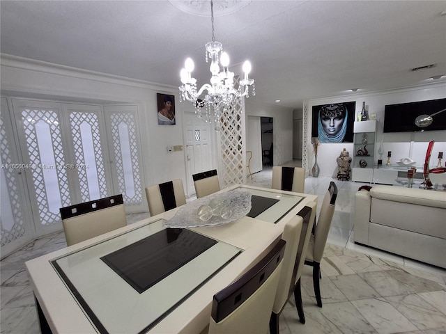 dining area featuring an inviting chandelier and ornamental molding