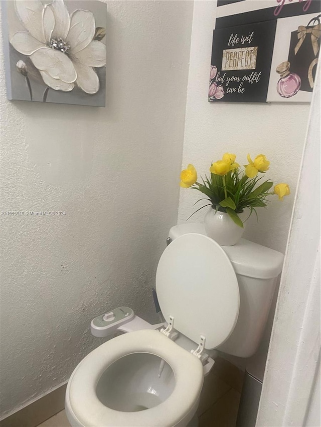 bathroom featuring toilet