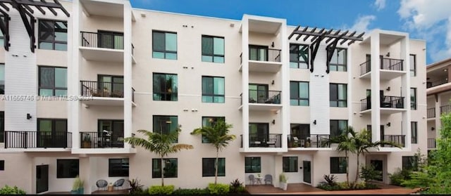 8001 NW 41st St Unit F-310, Doral, FL 33166 - view of apartment building / complex