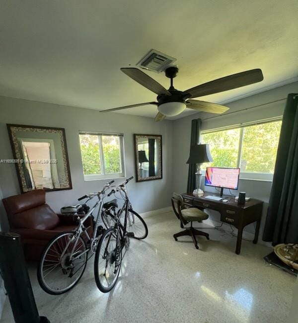 miscellaneous room featuring ceiling fan