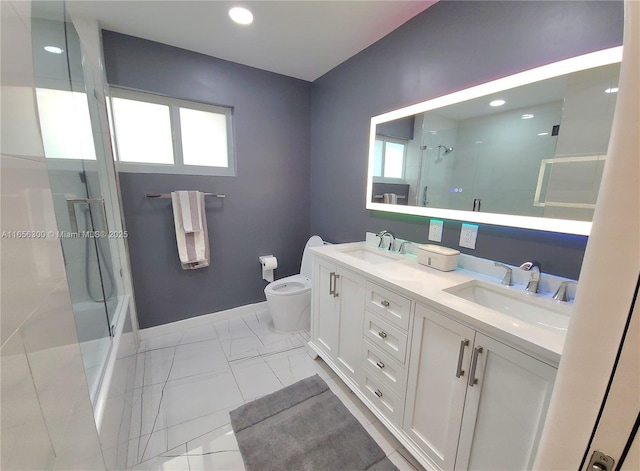 full bathroom with bath / shower combo with glass door, vanity, and toilet