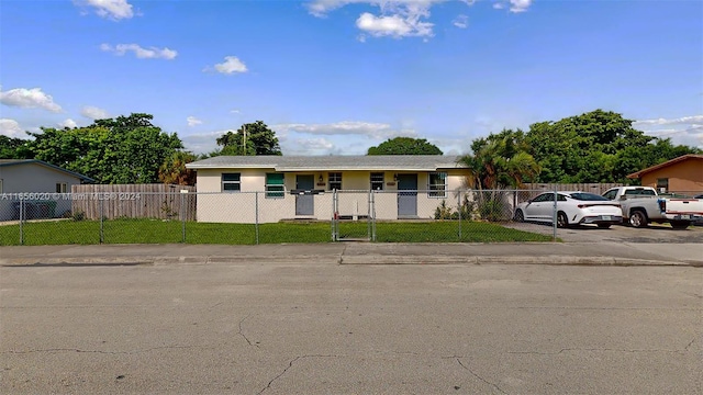 view of front of property with a front lawn