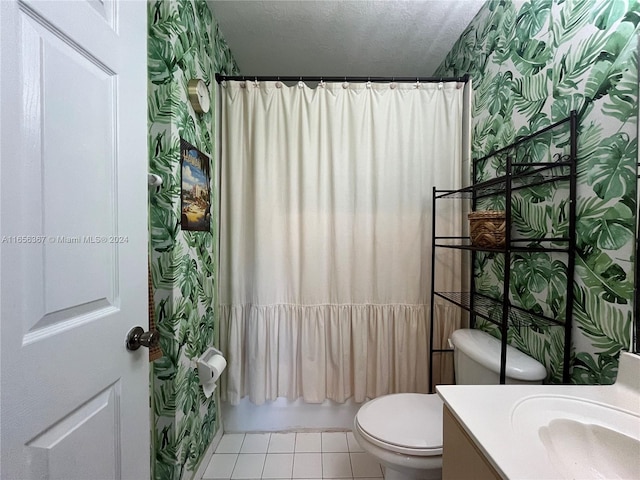 full bathroom featuring toilet, tile patterned flooring, vanity, a textured ceiling, and shower / tub combo with curtain