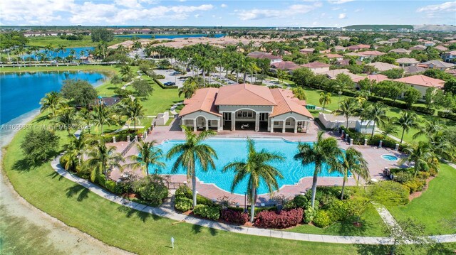 drone / aerial view with a water view