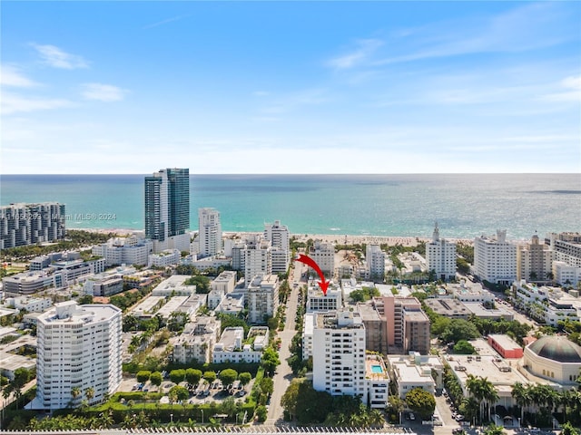 drone / aerial view featuring a water view