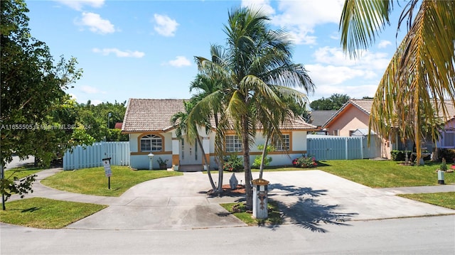 view of front of home with a front lawn