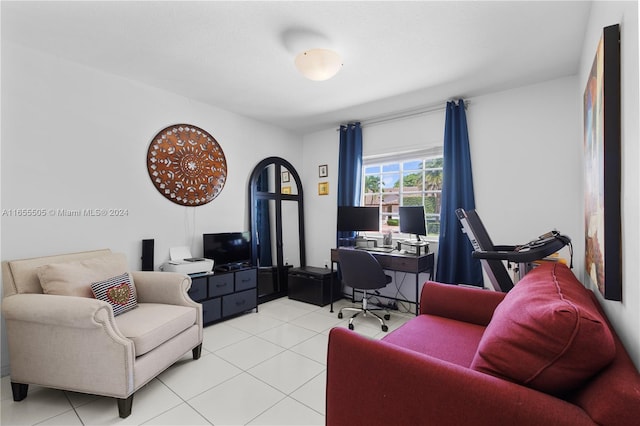 living room with tile patterned floors