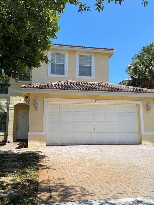 view of front of house with a garage